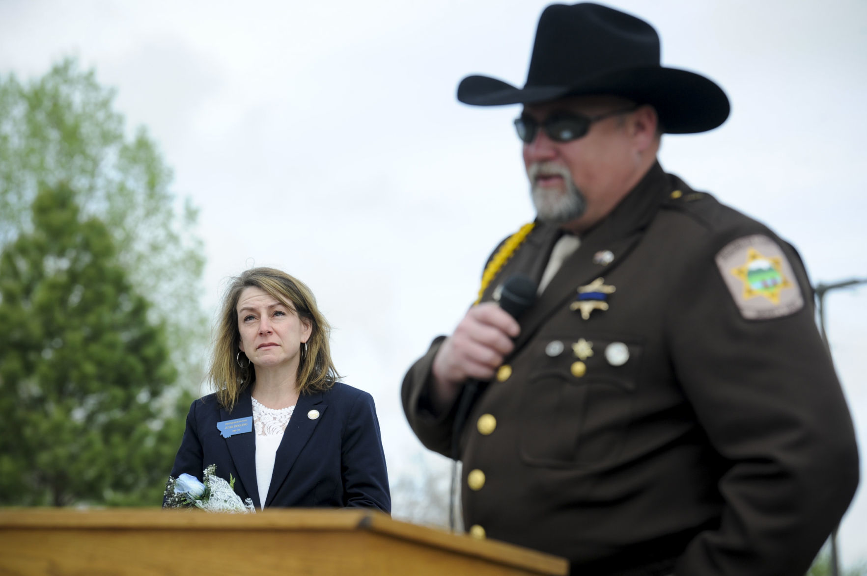Rep. Julie Dooling, R-Helena, left, looks to sky